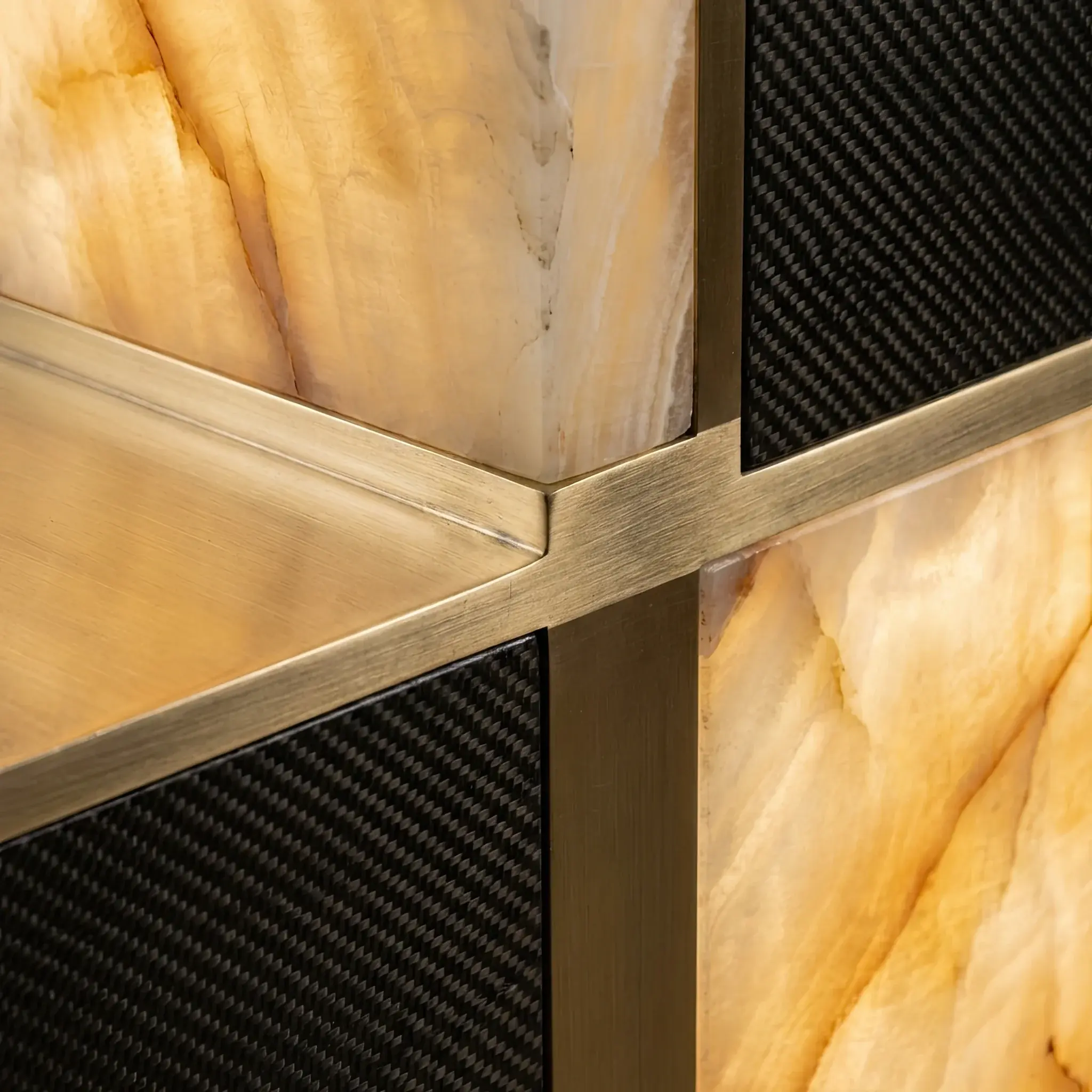 Interior detail: Examples of complex material combinations: metal, stone, and wood in one joint