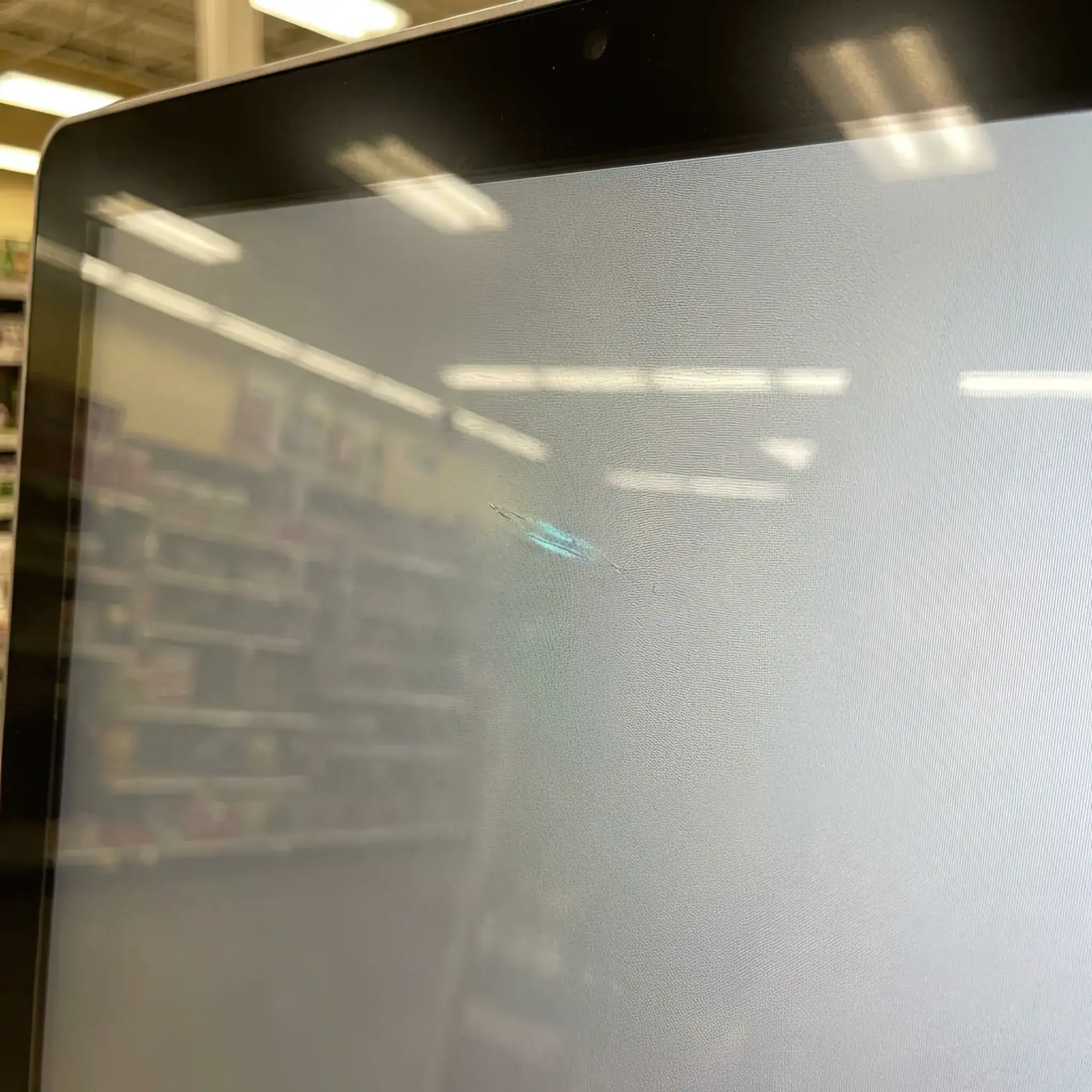 Interior detail: 2026 checkout kiosk with Checkout-RE coating: payment zone durability illustration